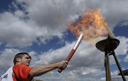奥运圣火通过什么方式传回北京